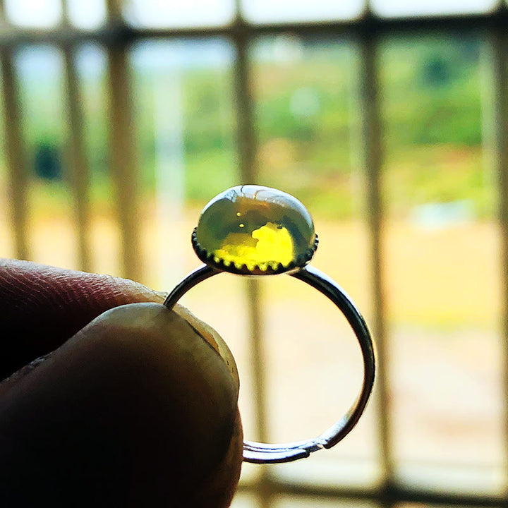 Anello regolabile semplice a semicerchio con pietra di luna e opale Olivenorma 