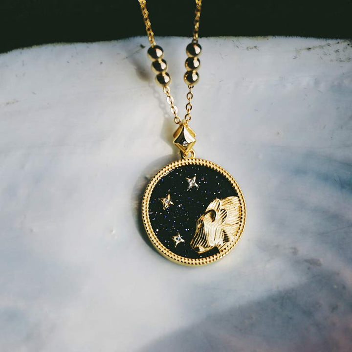 Collana Zodiaco in ascolto in arenaria blu 