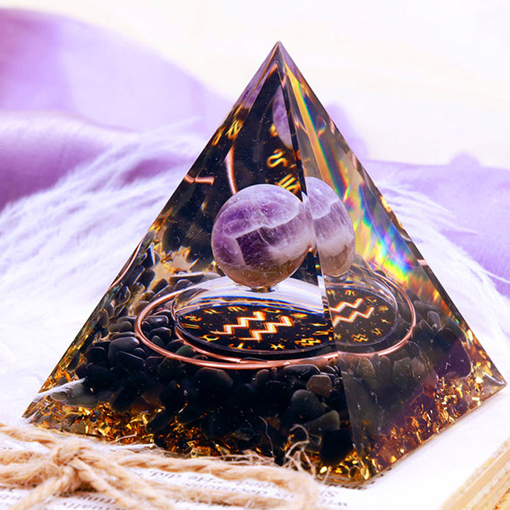 Sfera di ametista Olivenorma con piramide di orgone dello zodiaco Acquario in ossidiana 