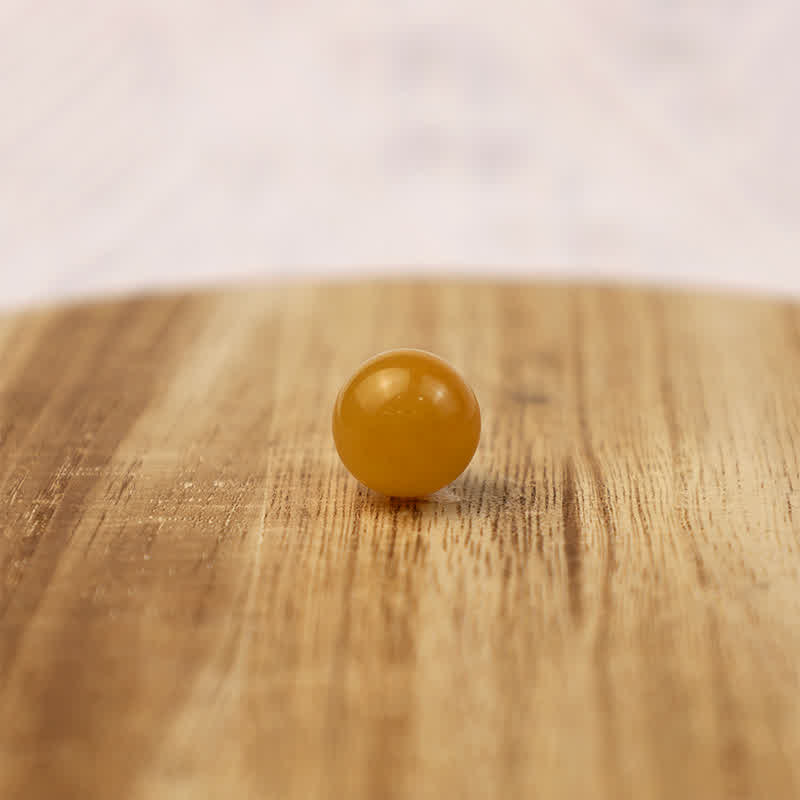 Sfera di cristallo positivo di giada gialla Olivenorma