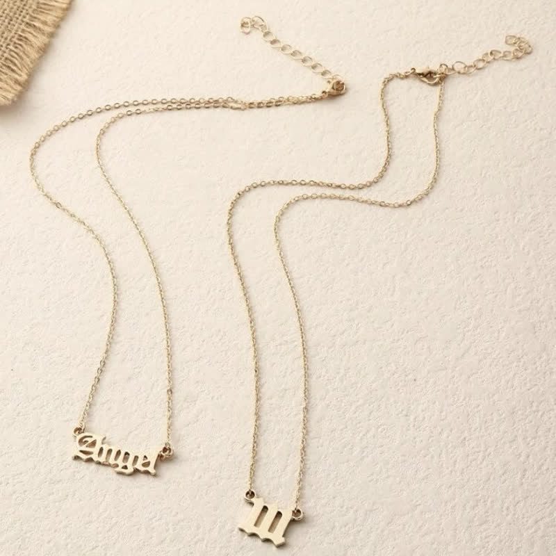 Collana doppia delicata con numero angolare e angelo Olivenorma 