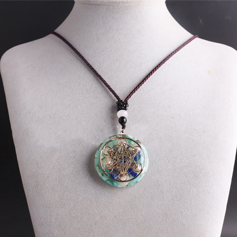 Collana con ciondolo in perla di lapislazzuli e cubo di Metatron in amazzonite Olivenorma
