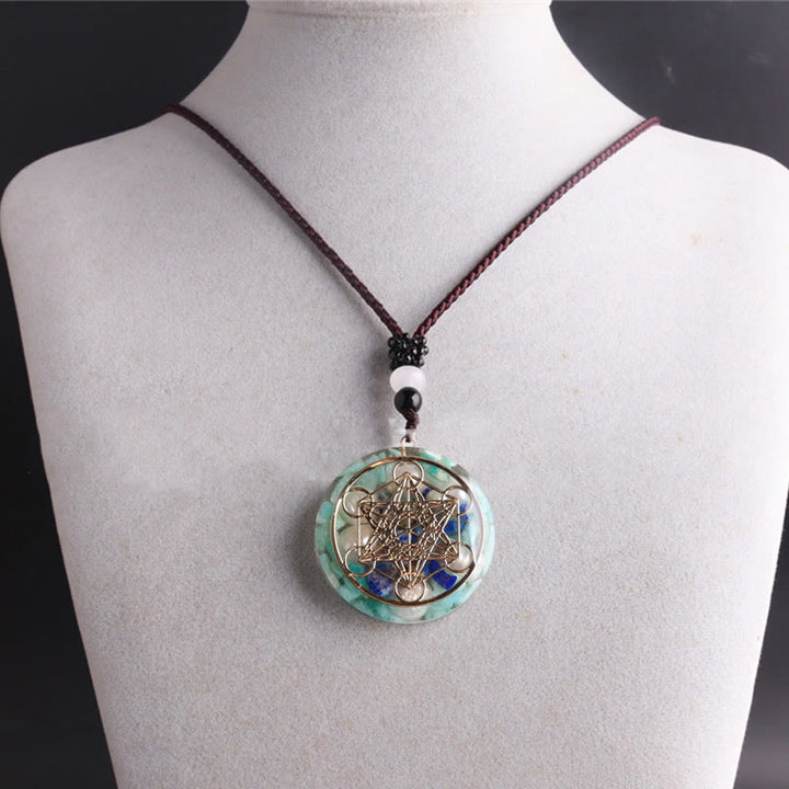 Collana con ciondolo in perla di lapislazzuli e cubo di Metatron in amazzonite Olivenorma