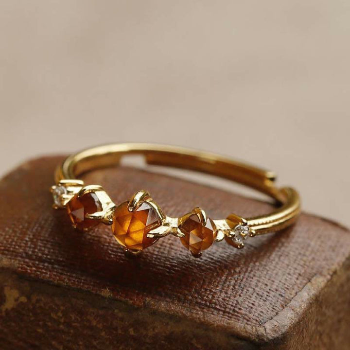 Anello con granato arancione regolabile Olivenorma