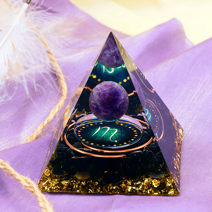 Sfera di ametista Olivenorma con piramide di orgone dello zodiaco Scorpione in ossidiana 