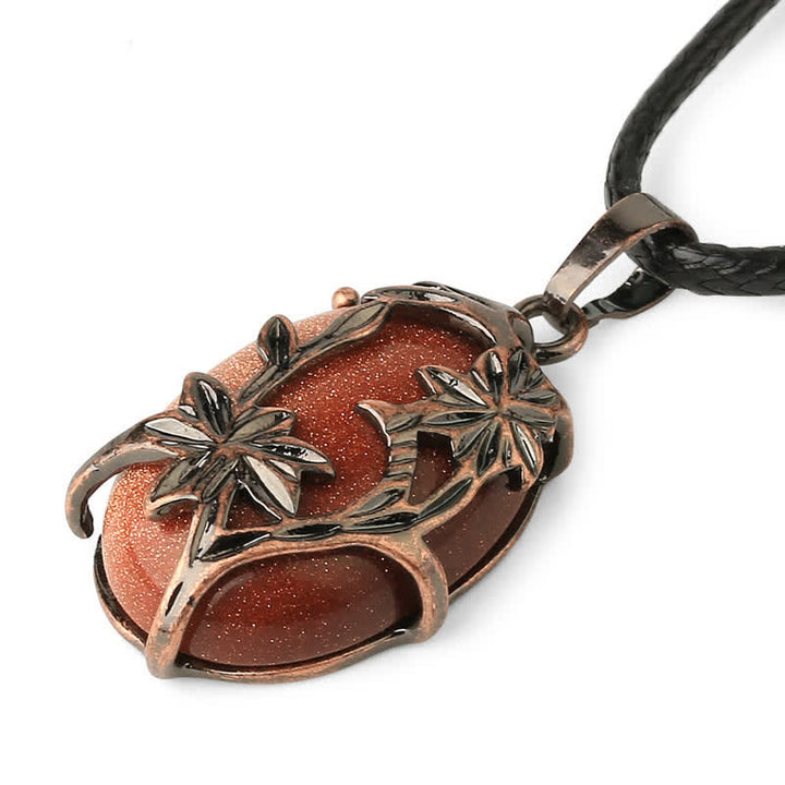 Collana con fiore in ottone e ametista Olivenorma avvolto in cristallo