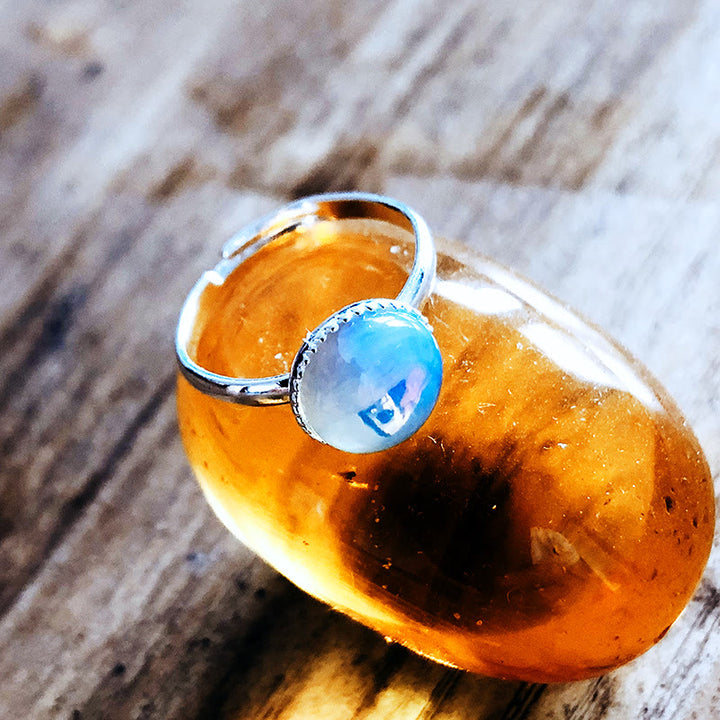 Anello regolabile semplice a semicerchio con pietra di luna e opale Olivenorma 