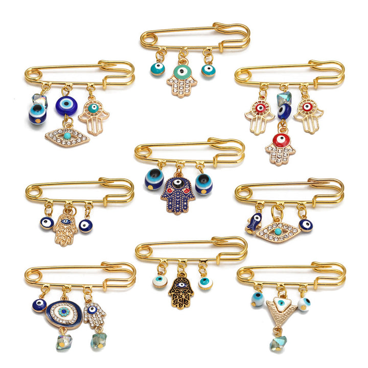 Spilla serie Hamsa con occhio malvagio Olivenorma