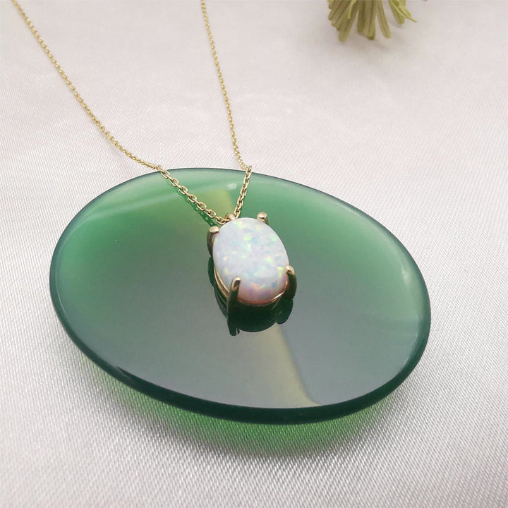 Collana Olivenorma in rame placcato oro 18k con opale bianco blu