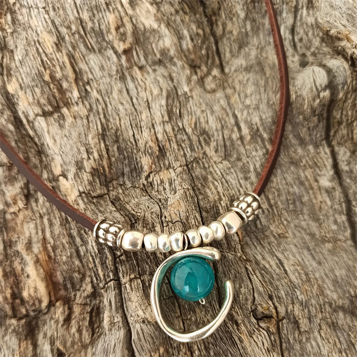 Collana in corda di pelle con ciondolo a mezzo anello in acquamarina Olivenorma 
