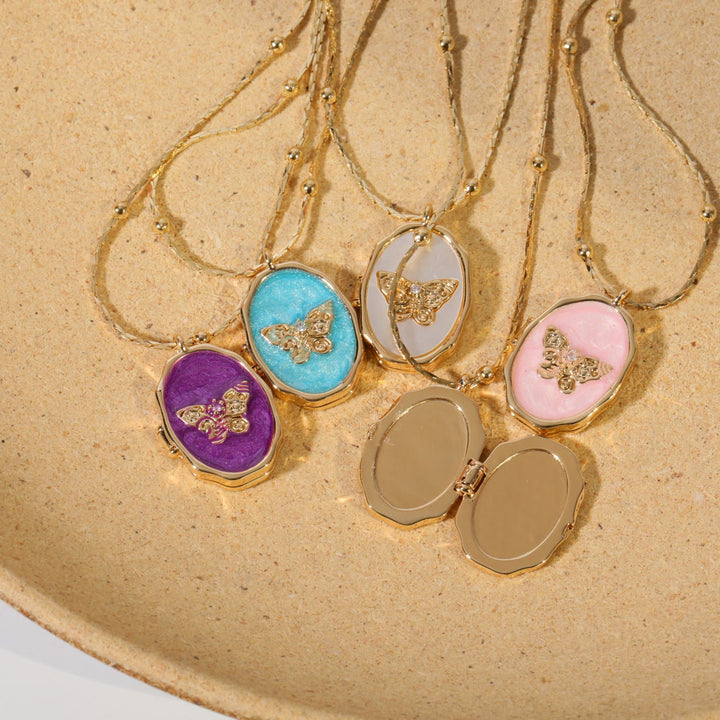 Collana con pendente a farfalla in madreperla Olivenorma in rame placcato oro 14k 