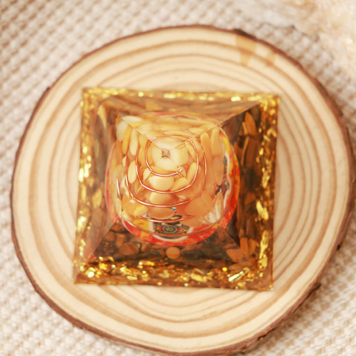 Olivenorma Sun Stone con occhio di tigre Hamsa Orgone Pyramid 