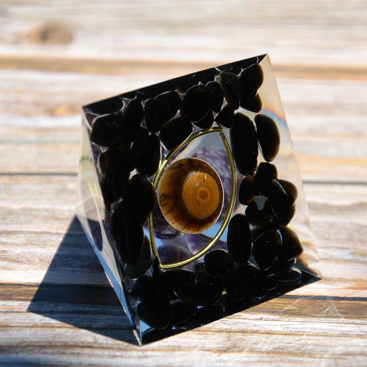 Sfera di ametista Olivenorma con piramide di orgone in ossidiana occhio di tigre 