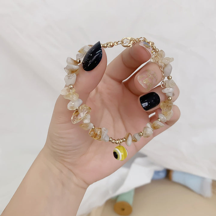 Braccialetto con ciondolo in ghiaia di cristallo naturale Olivenorma contro il malocchio 