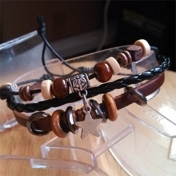Olivenorma Bracciale da uomo in pelle intrecciata con ciondolo a forma di stella a croce