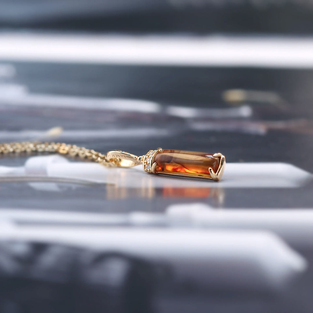 Collana con ciondolo ad anello in ambra artificiale Olivenorma 