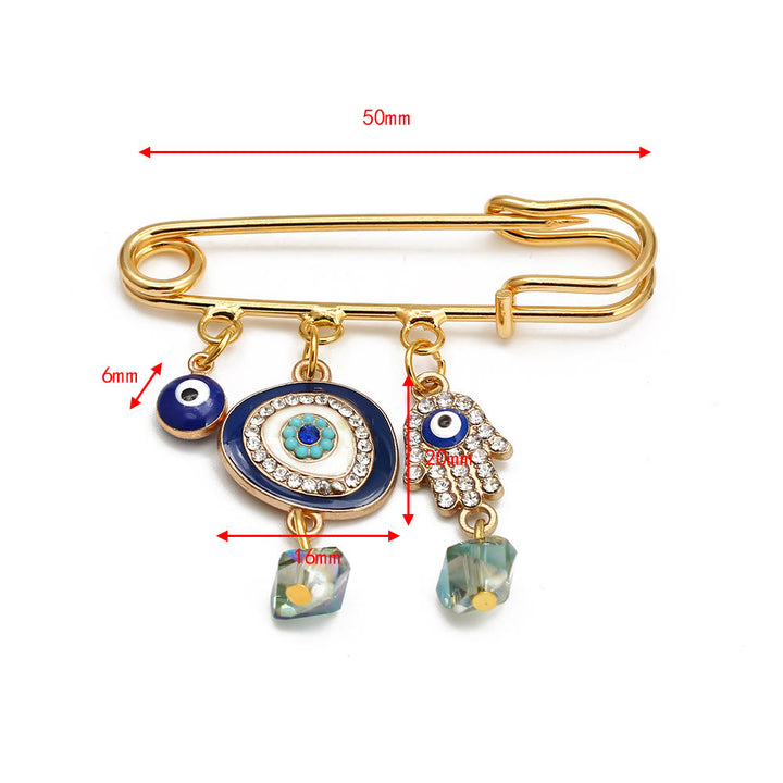 Spilla serie Hamsa con occhio malvagio Olivenorma