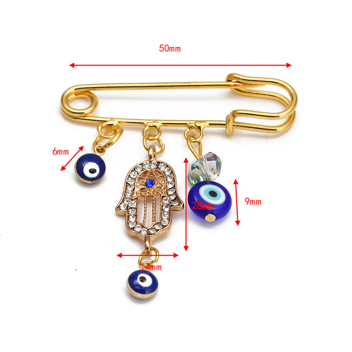 Spilla serie Hamsa con occhio malvagio Olivenorma