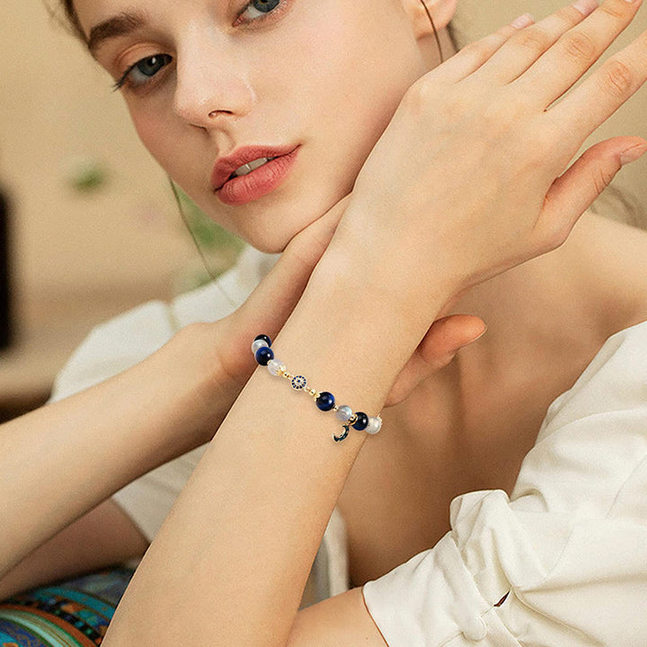 Bracciale con occhio maligno in pietra di luna e zaffiro Olivenorma