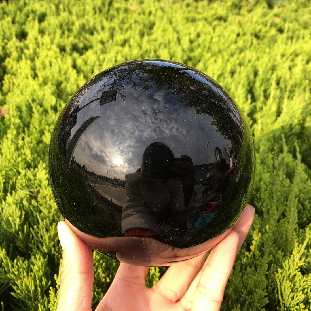 Decorazione una sfera di cristallo di ossidiana Olivenorma