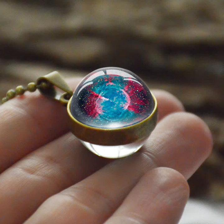 Collana creativa con sfera di vetro e luna e stella
