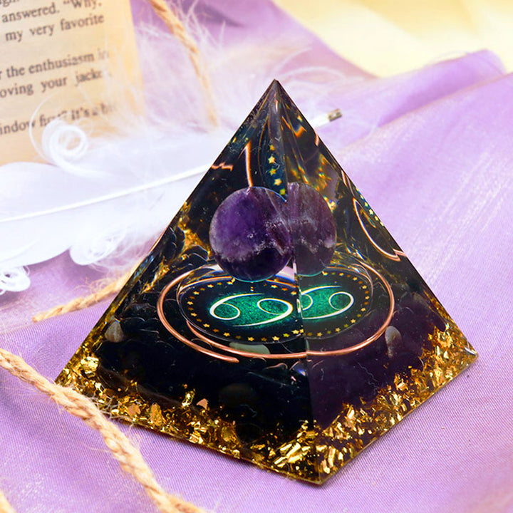 Sfera di ametista Olivenorma con piramide di orgone dello zodiaco Cancro in ossidiana 