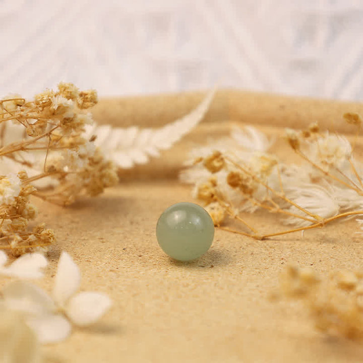 Sfera di cristallo della prosperità in avventurina verde Olivenorma