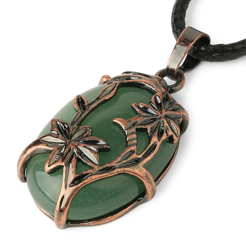 Collana con fiore in ottone e ametista Olivenorma avvolto in cristallo