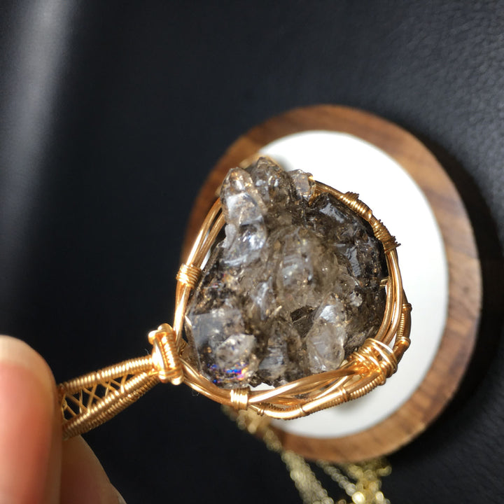 Collana con ciondolo in filo di rame avvolto in quarzo fumé naturale Olivenorma