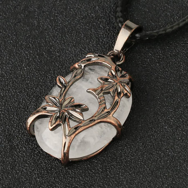Collana con fiore in ottone e ametista Olivenorma avvolto in cristallo