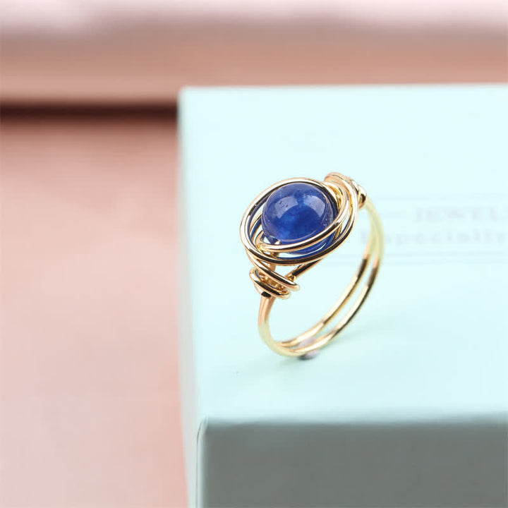 Anello di cristallo curativo avvolto in filo