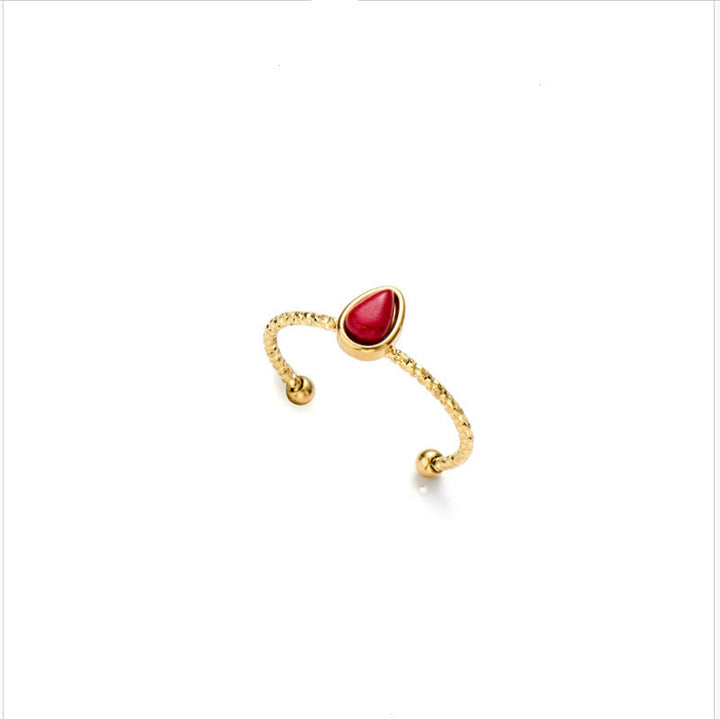 Anello in acciaio al titanio 18k con goccia d'acqua in pietra naturale Olivenorma