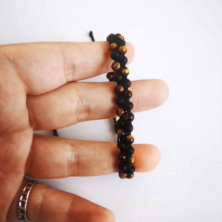 Bracciale intrecciato con perline di onice nero e occhio di tigre Olivenorma
