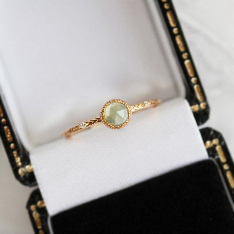 Anello Olivenorma con peridoto verde taglio rotondo naturale