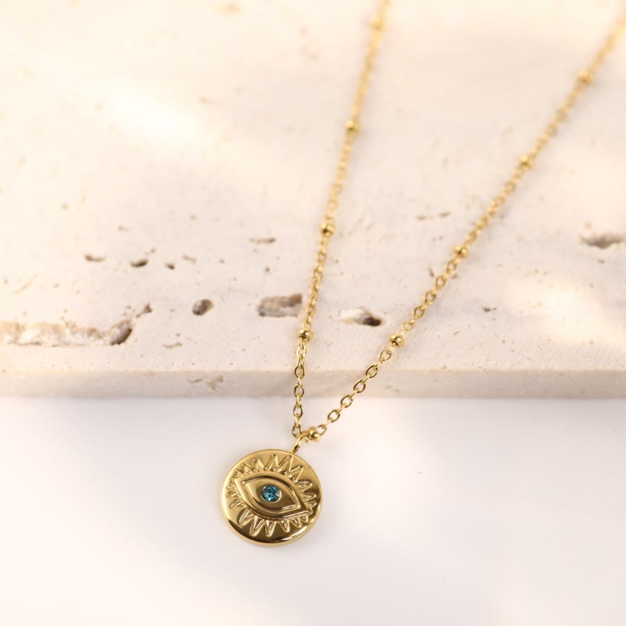 Collana in acciaio al titanio 316L con topazio blu e malocchio Olivenorma 