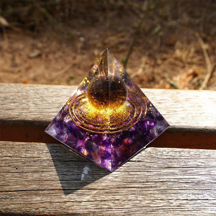 Olivenorma Sfera di quarzo fumé con piramide di orgone di ametista 