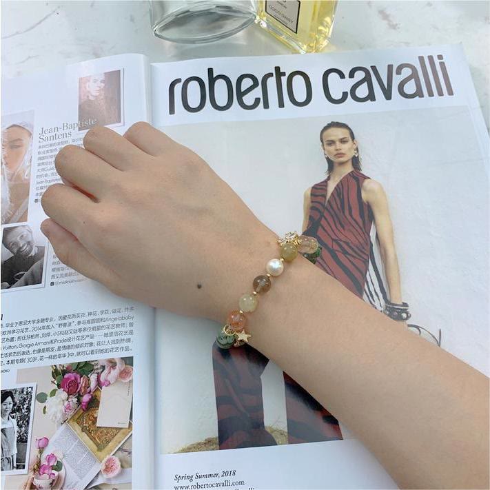 Bracciale Olivenorma con perline di luna, stella e quarzo rutilato in oro e tormalina 