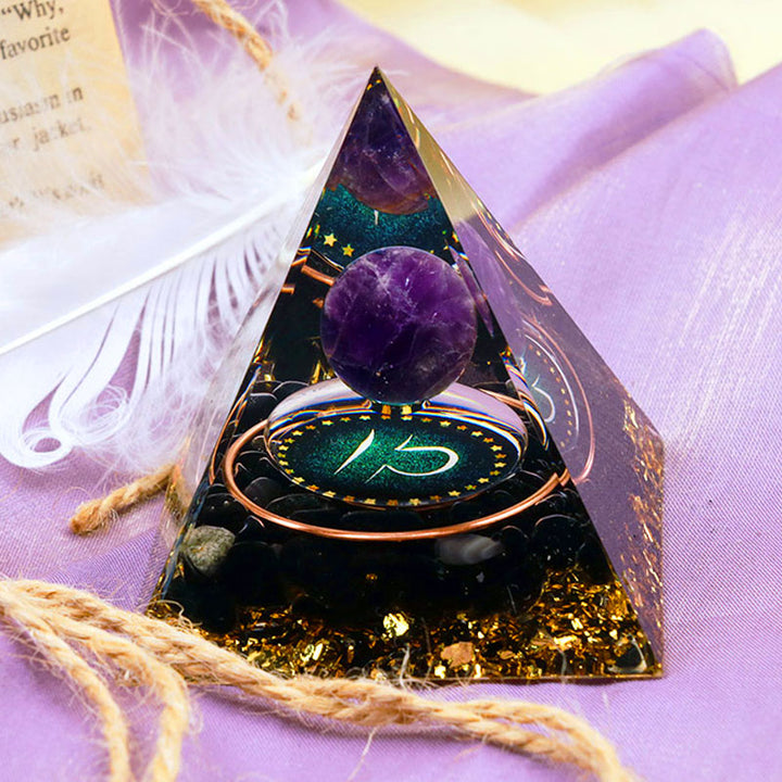 Sfera di ametista Olivenorma con piramide di orgone dello zodiaco Bilancia in ossidiana 