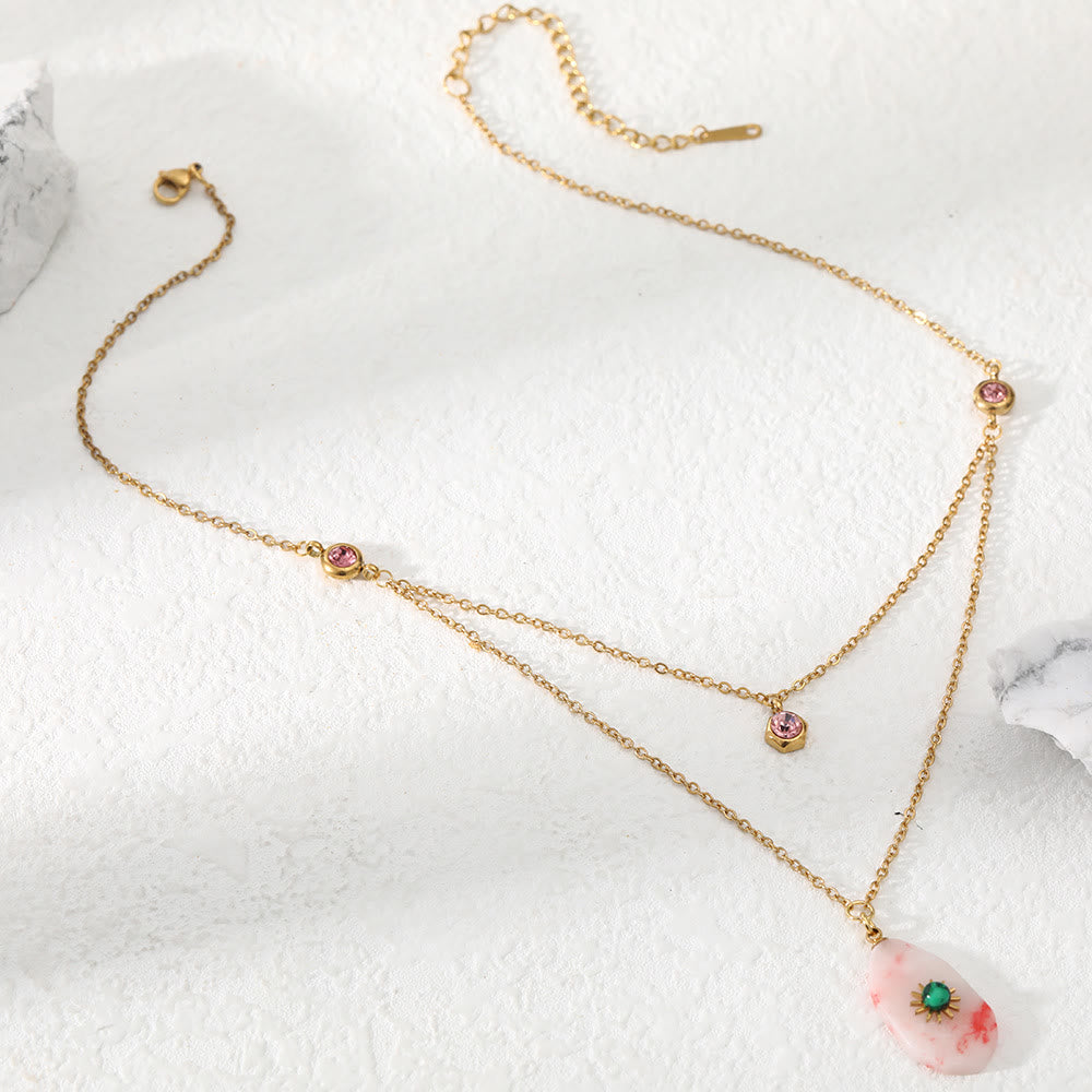 Collana Olivenorma con doppio pannello in zirconio rodocrosite 
