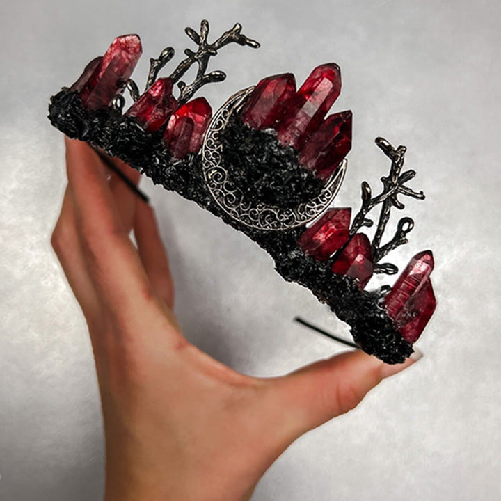 Corona di cristallo con ramo di luna stregata in quarzo rosso Olivenorma