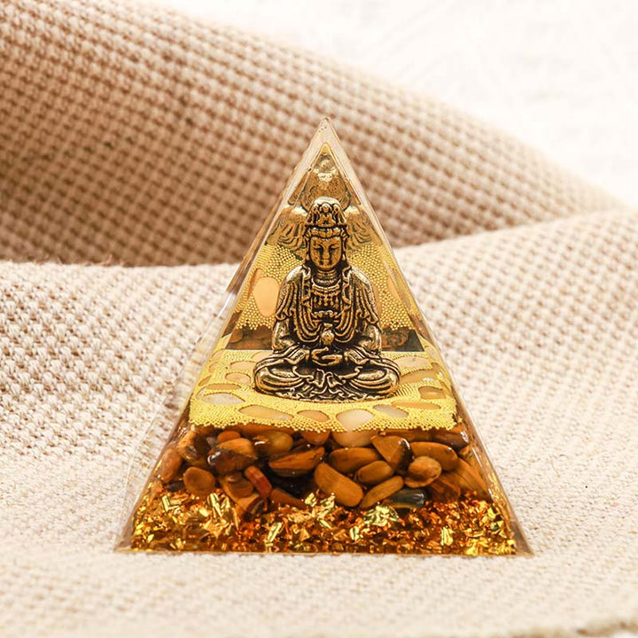 Buddha Olivenorma con piramide di orgone con protezione dell'occhio di tigre