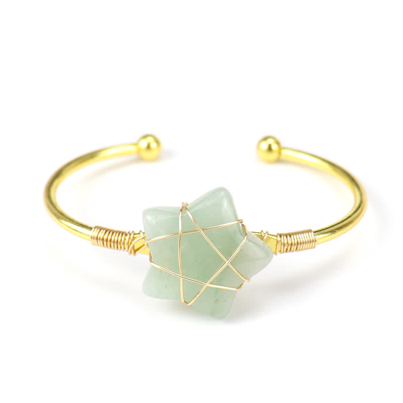 Bracciale Olivenorma con pietre preziose a forma di stella avvolte in filo d'oro
