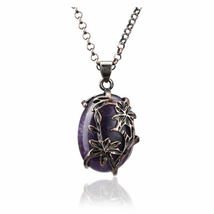 Collana con fiore in ottone e ametista Olivenorma avvolto in cristallo