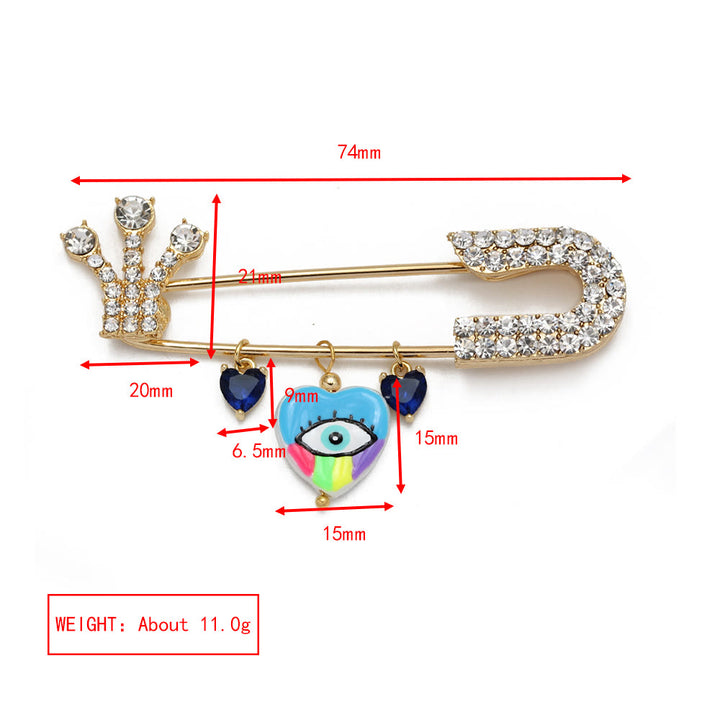 Spilla a forma di cuore con occhio maligno in zircone bianco Olivenorma 