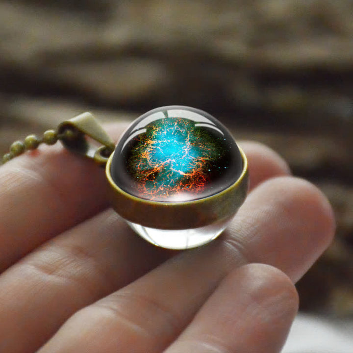 Collana creativa con sfera di vetro e luna e stella