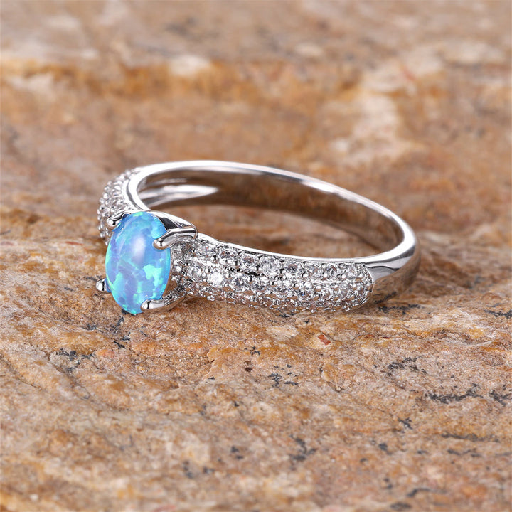 Anello Olivenorma "Shiny Elegance" con fascia in zircone e opale rotondo