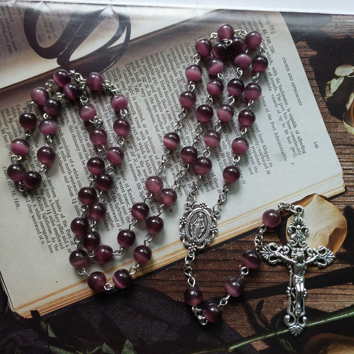 Collana rosario Olivenorma con croce in argento e pietra occhio di gatto viola