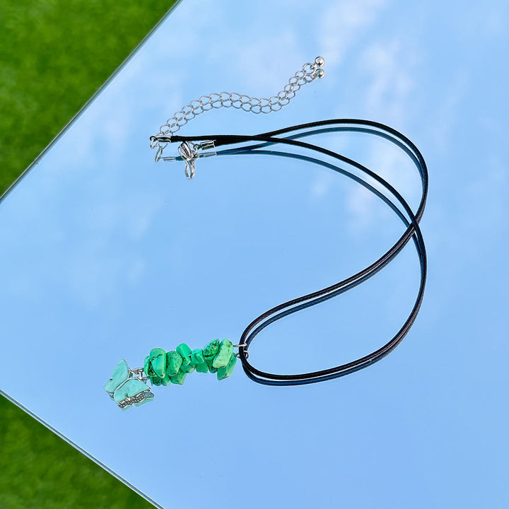 Collana in filo di cera di pelle con nappa a farfalla in pietra naturale Olivenorma