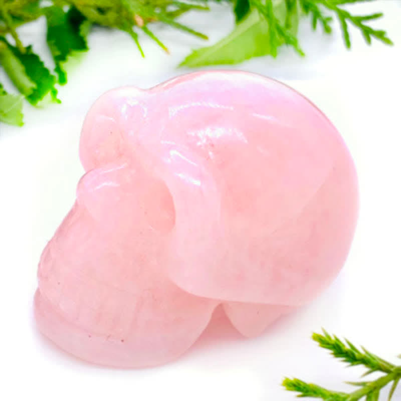 Decorazione teschio di cristallo di quarzo rosa
