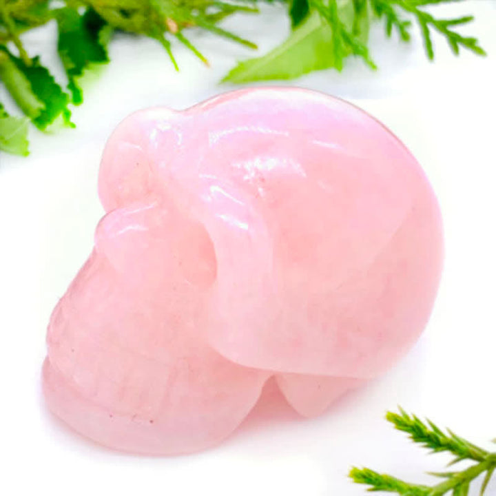 Decorazione teschio di cristallo di quarzo rosa